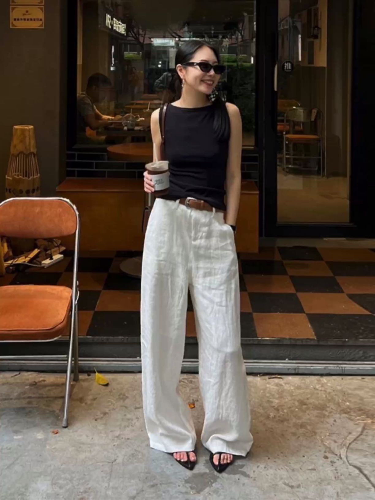 chic ensembles with high waisted pants.