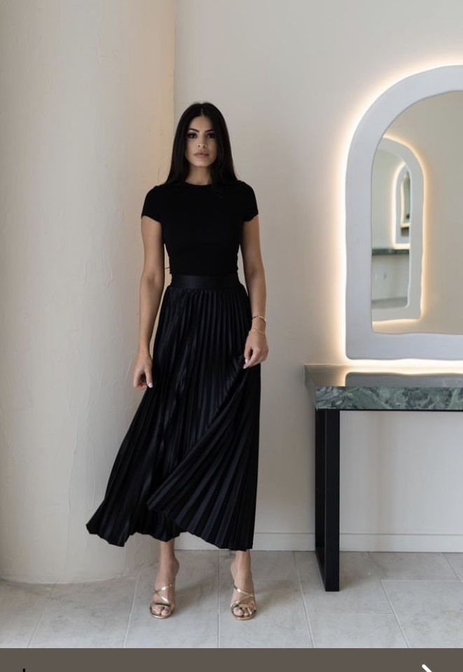 chic looks with a black satin skirt