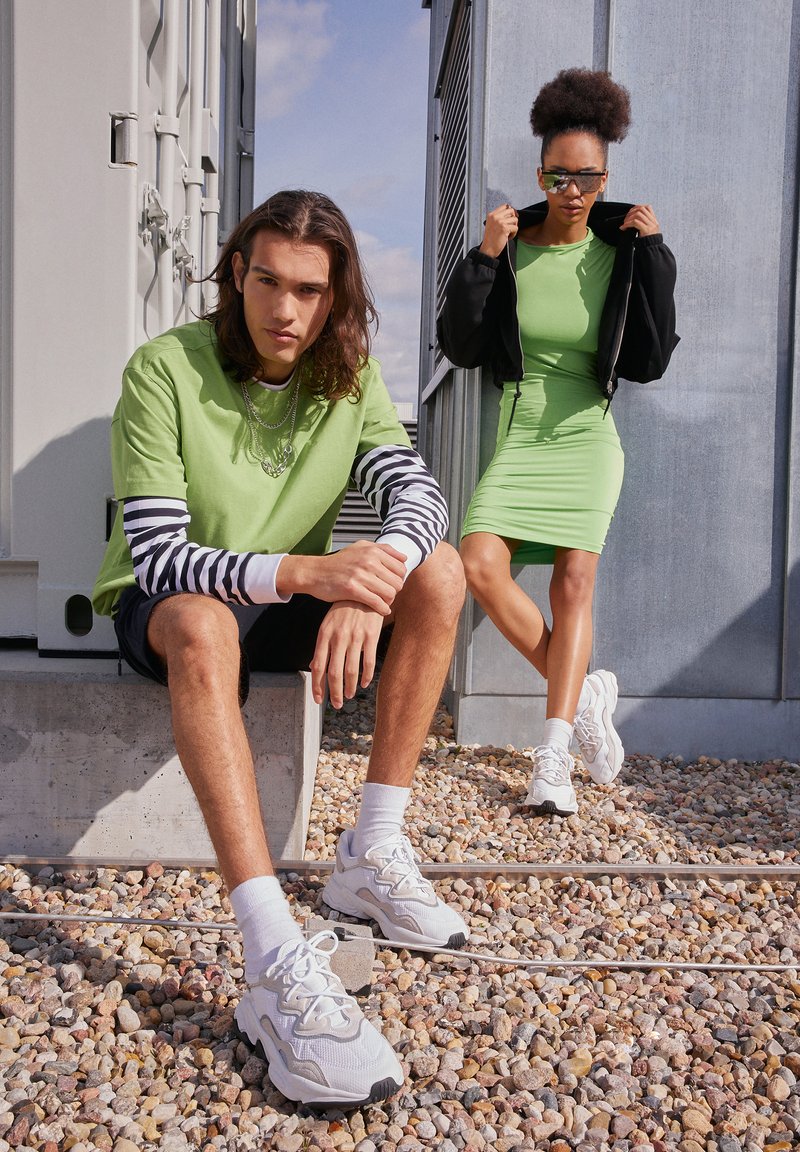 chic outfits centered around Adidas ozweego