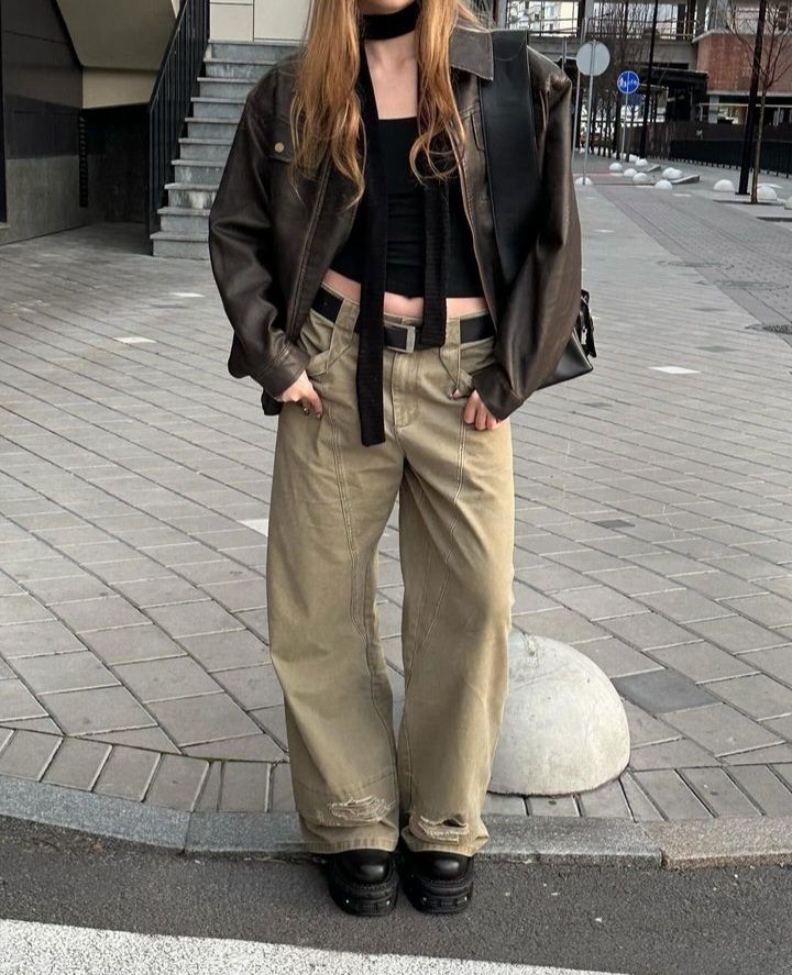 dressing up a brown leather jacket.