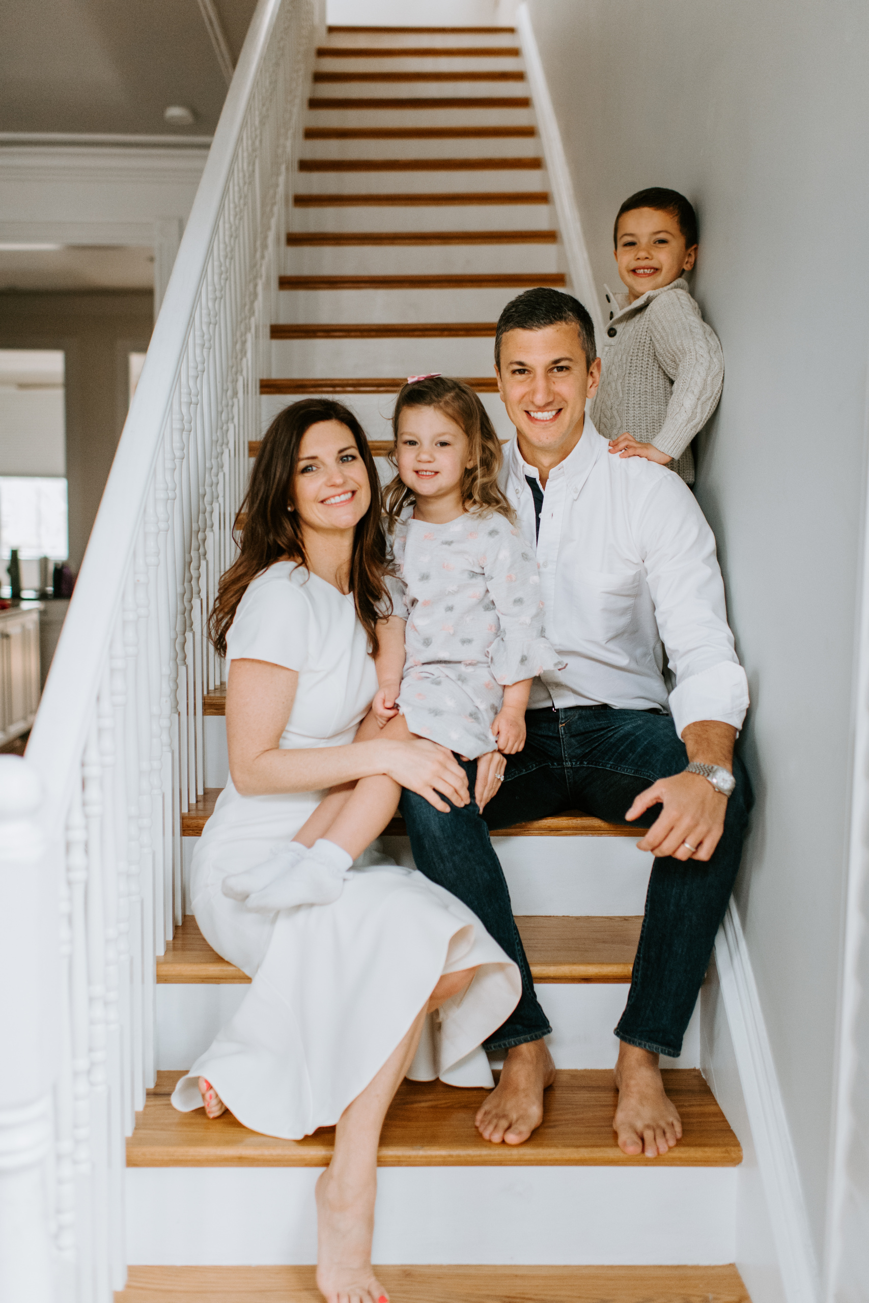 playful indoor family photo outfit ideas for creative family portraits.